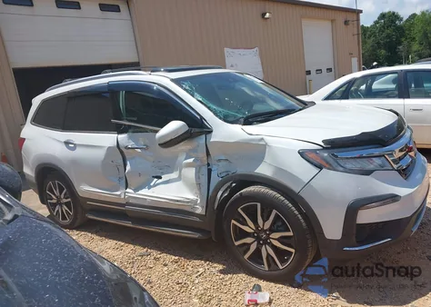 2022 Honda Pilot 2Wd Touring 8 Passenger z USA, uszkodzony, nr VIN 5FNYF5H96NB004676